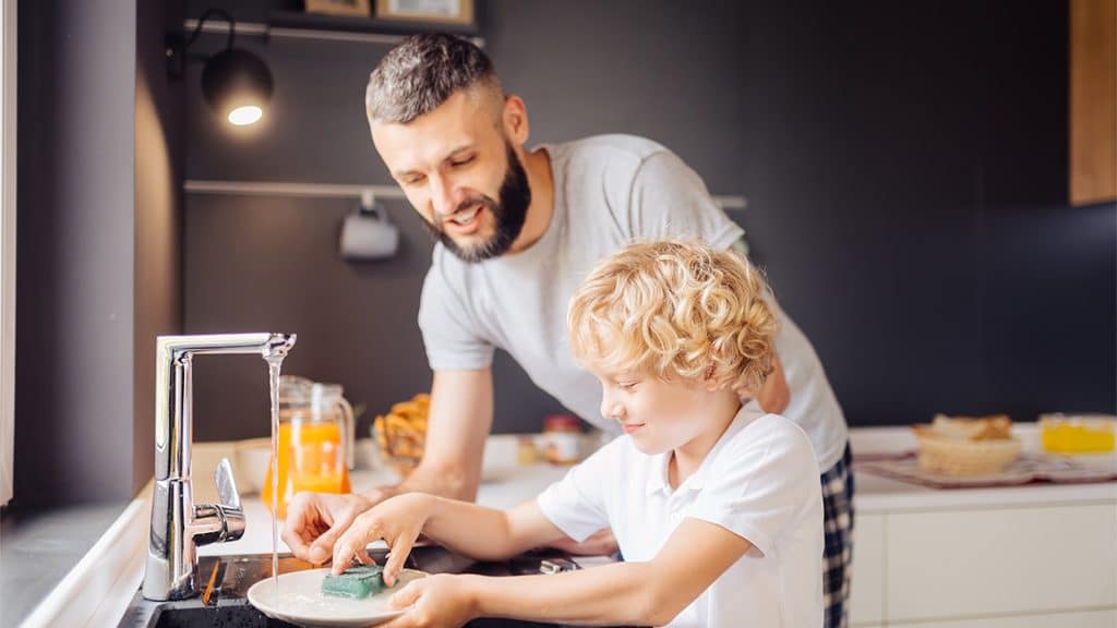 Man with son in kitchen