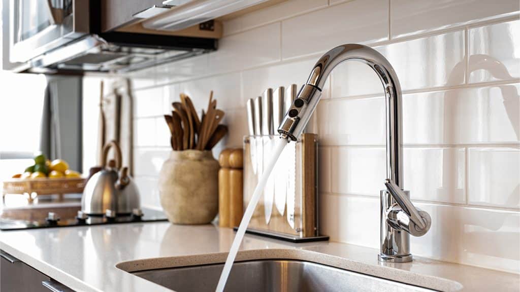 kitchen sink with water running
